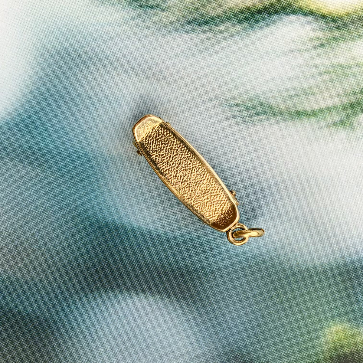 Ollie, Vintage Rolling Skateboard Charm