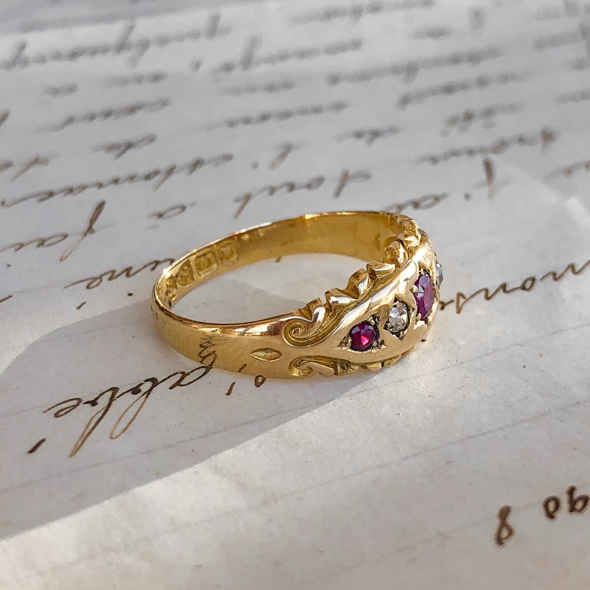 1899 Isolde, 18ct Antique Ruby Diamond Band