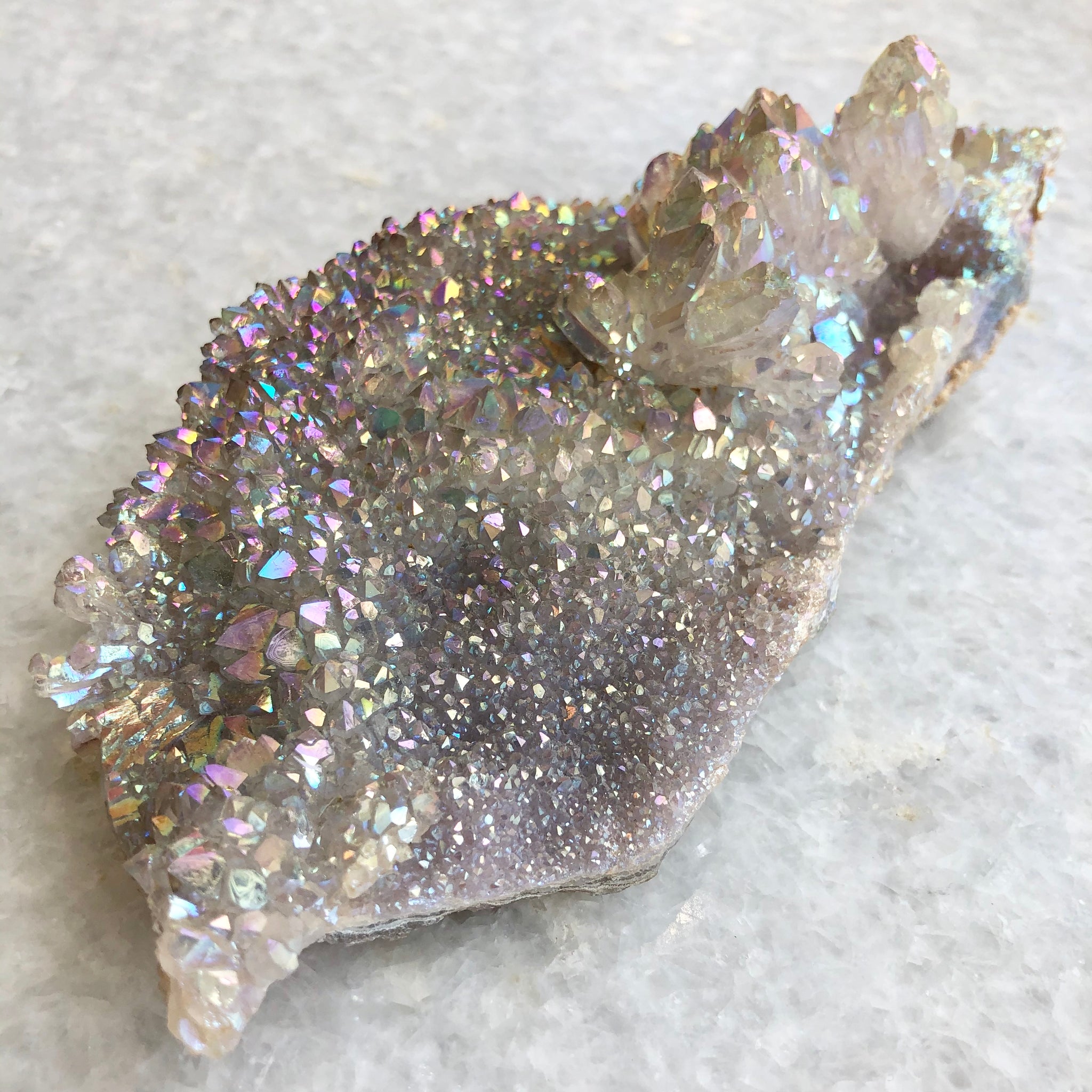 Angel Aura Quartz Raw Point | Ethical Crystals, Ascension Jewelry and  Energy Tools | Shaman Sisters